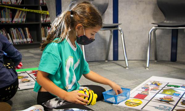 Girl uses BeeBot